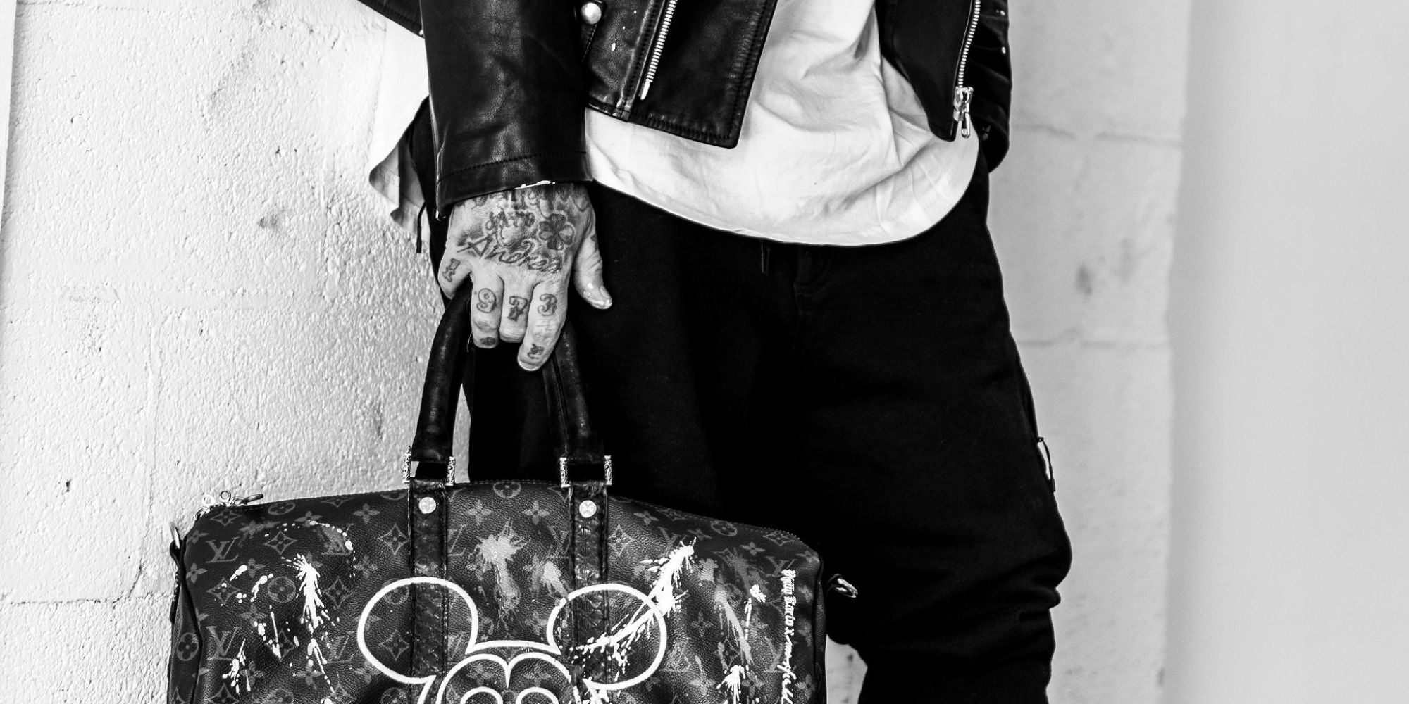Artist Philip Karto with his own cration on a vintage Louis Vuitton bag