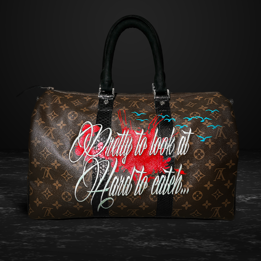 ButterFly Keepall 55 with water snake trimmings