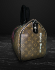 Classic Flamingo Louis Vuitton Keepall 55 bag with cotton textile lining