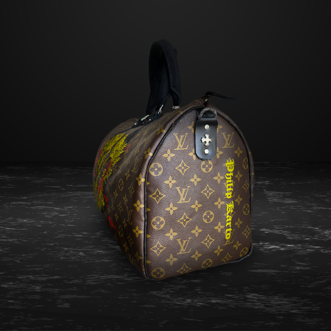 Cabin size Louis Vuitton Keepall 55 with water snake trimmings