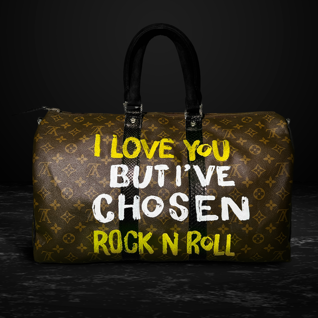 Light and supple Louis Vuitton Keepall 55 with removable strap