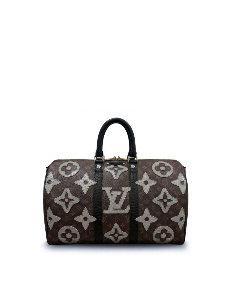 Philip Karto vintage Louis Vuitton handbag with python leather monogram pattern on a white background