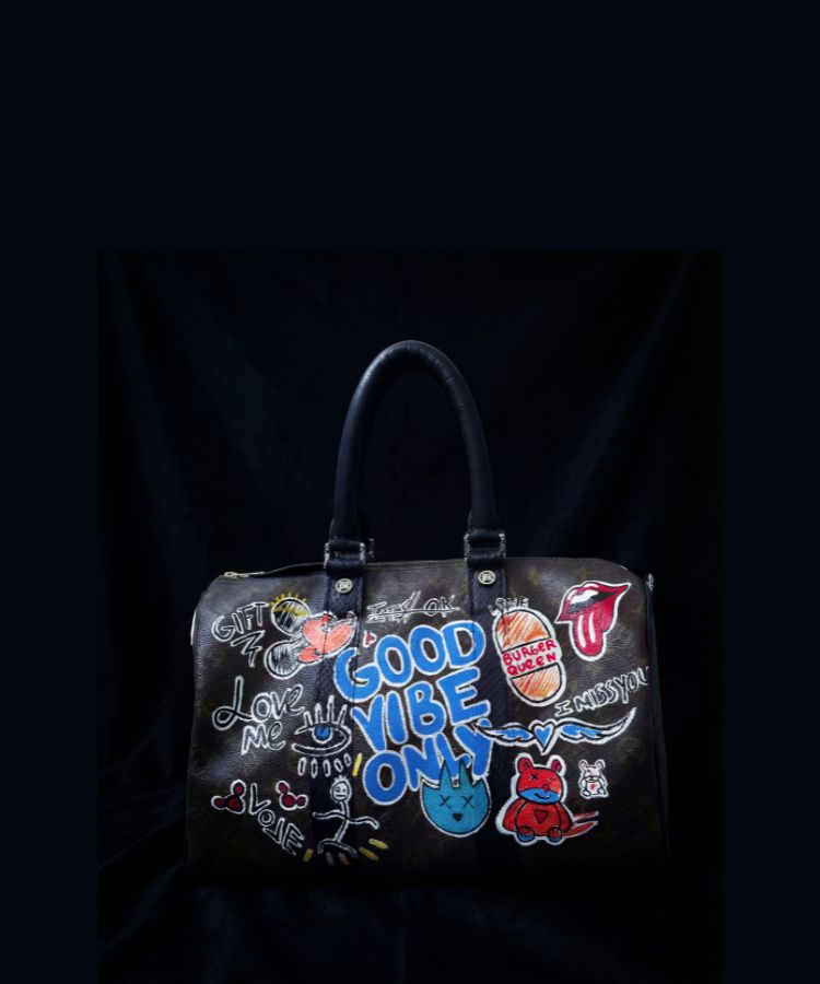 Front view of Philip Karto PK.03 Good Vibes Speedy bag ona  balck background created from vintage Louis Vuitton canvas