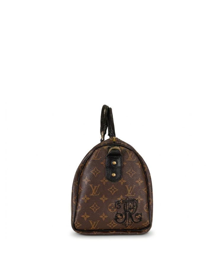 Left side view of Philip Karto PK.03 Bip Bip and Coyote Speedy bag created from vintage Louis Vuitton canvas